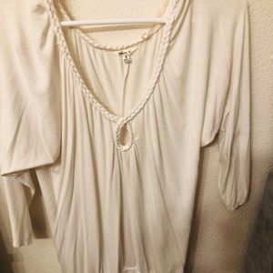 White shirt with rope around neckline